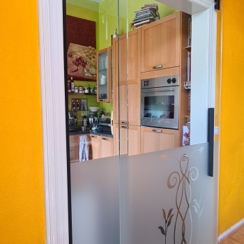 Glastur Schiebetur Stahlrollensystem